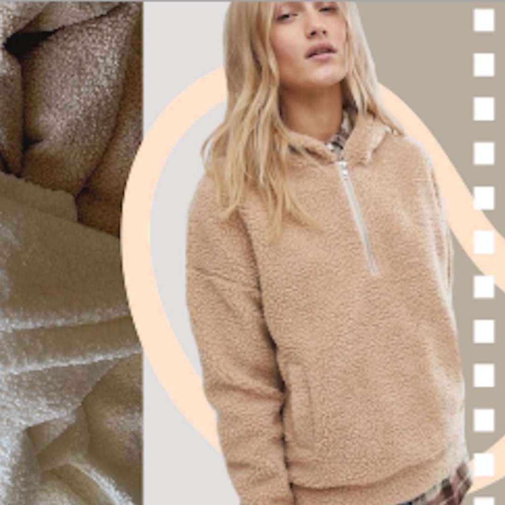 Girl dressed in a stone teddy fleece sweater