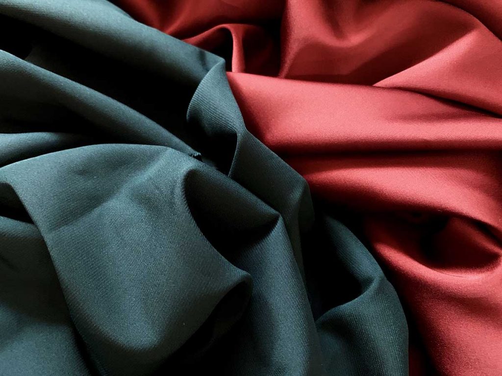 Green and red satin in a draped display
